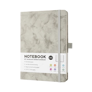 Doodlations Coffee Bar & Boutique A5 hardcover dotted notebook with a grey marble pattern and elastic band closure.
