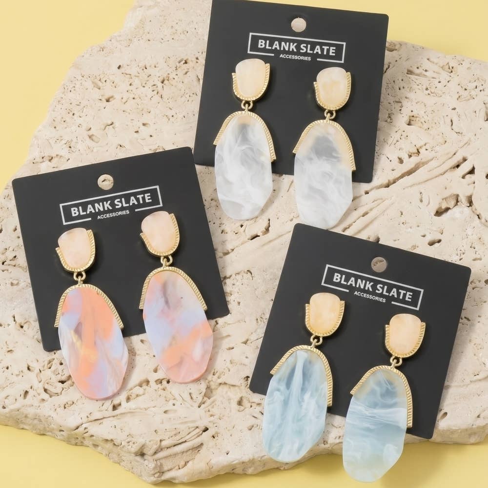 Doodlations Coffee Bar & Boutique BLANK SLATE ACCESSORIES marble resin teardrop earrings with gold-tone metal accents.