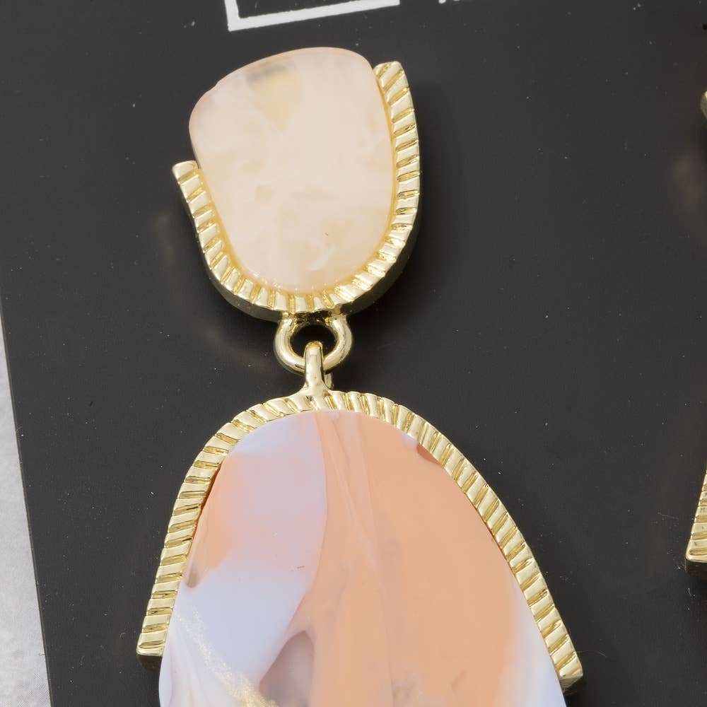 Doodlations Coffee Bar & Boutique marble-effect resin teardrop earrings with gold-tone metal trim on display card