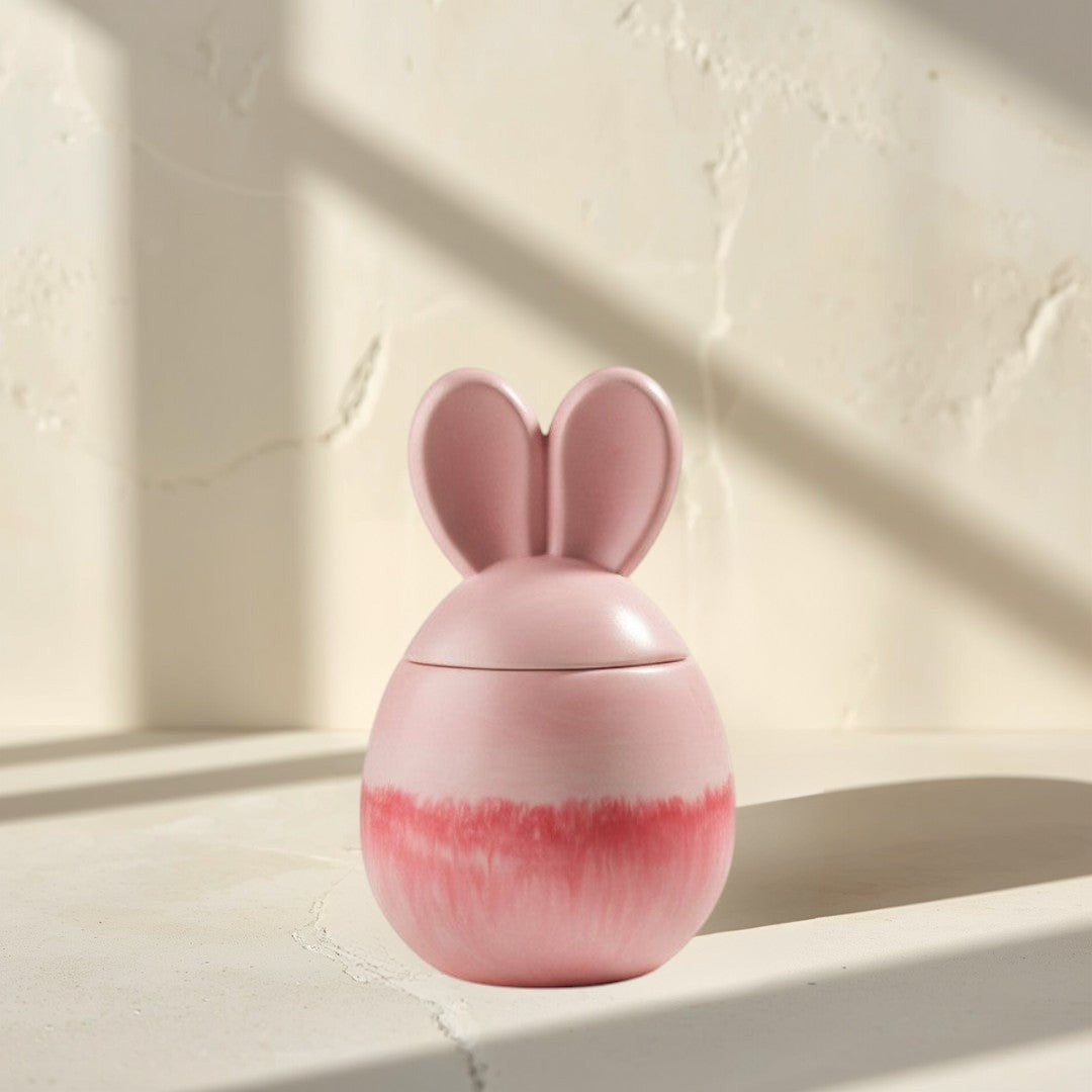 Doodlations Coffee Bar & Boutique marbled pink bunny candle with lid, soy blend wax, 9oz, sangria scent.