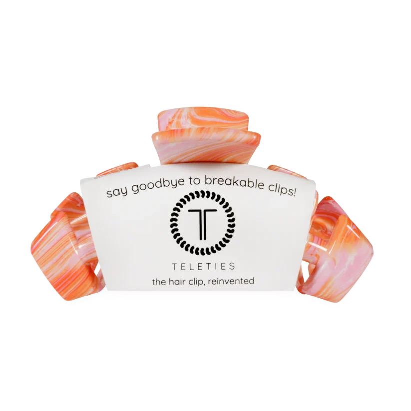 Doodlations Coffee Bar & Boutique Classic Just Keep Swimming claw hair clip in a pink and orange marbled pattern