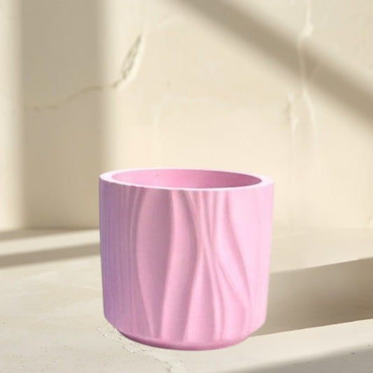 Doodlations Coffee Bar & Boutique Darlin Days marbled concrete candle in blue and pink wavy textured vessels.
