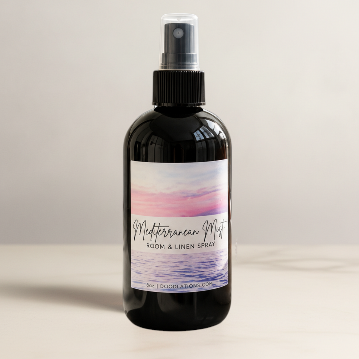 Doodlations Coffee Bar & Boutique Mediterranean Mist room and linen spray in a black bottle with a coastal label