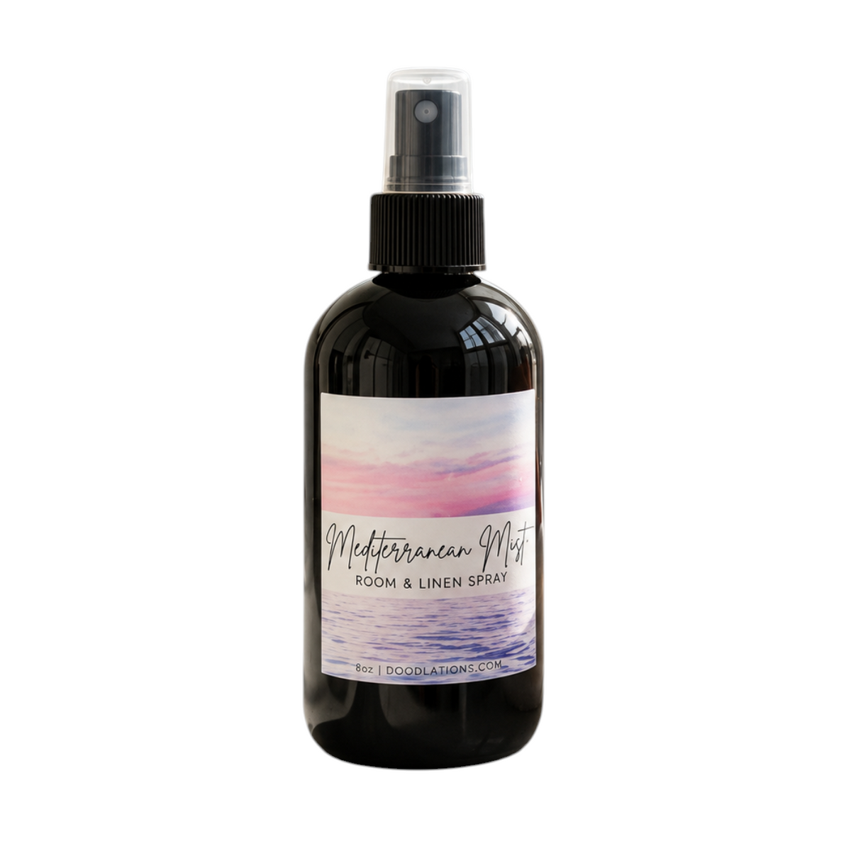 Doodlations Coffee Bar & Boutique Mediterranean Mist room and linen spray in an 8oz black bottle with coastal label.