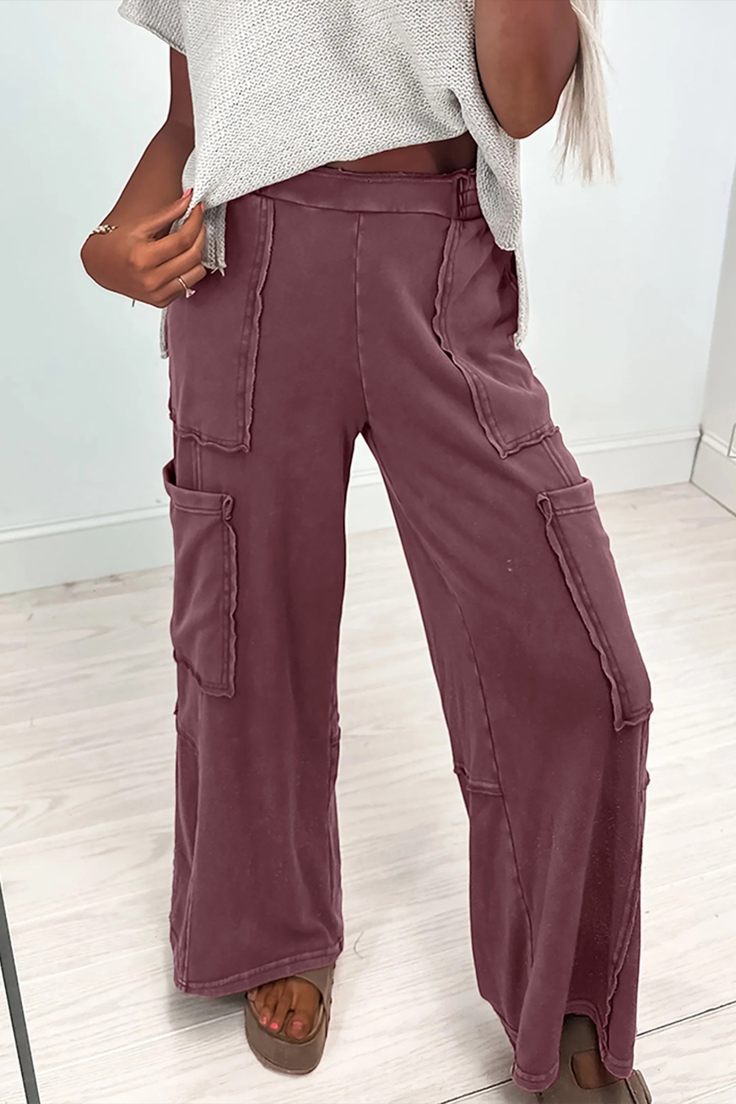Doodlations Coffee Bar & Boutique merlot mineral wash cargo sweatpants with raw seams and elastic drawstring waist.