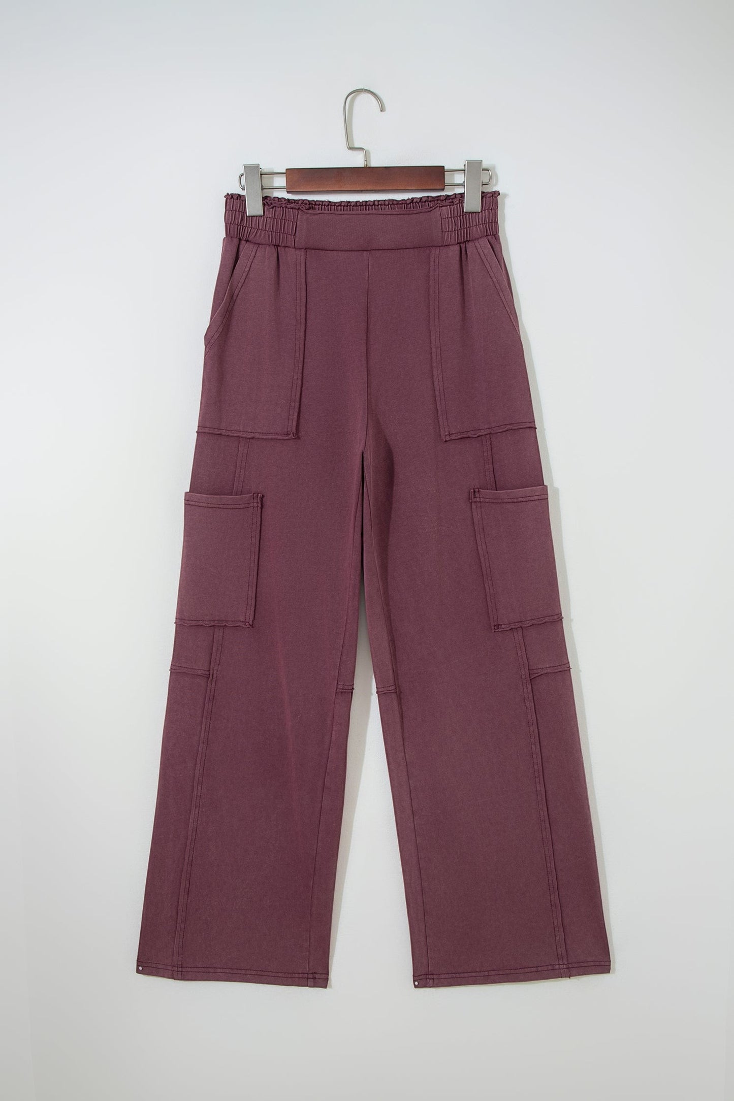 Doodlations Coffee Bar & Boutique merlot mineral wash cargo sweatpants with raw seams and elastic drawstring waist.