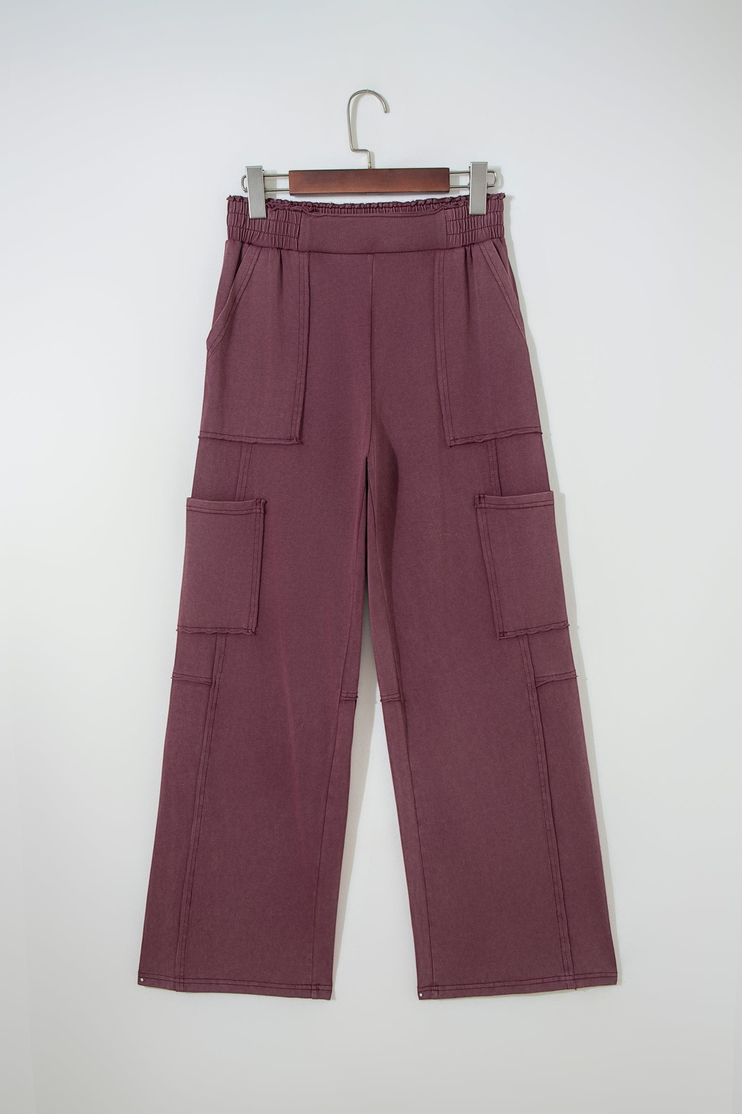 Doodlations Coffee Bar & Boutique merlot mineral wash cargo sweatpants with raw seams and elastic drawstring waist.