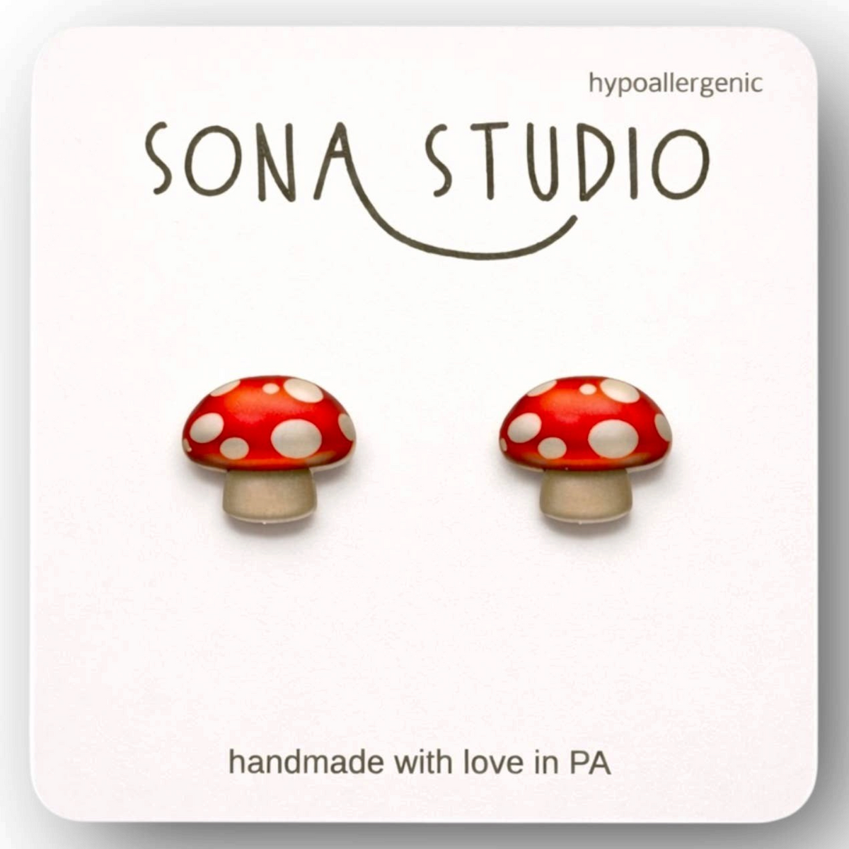 Doodlations Coffee Bar & Boutique handmade red and white mushroom stud earrings with hypoallergenic titanium posts.