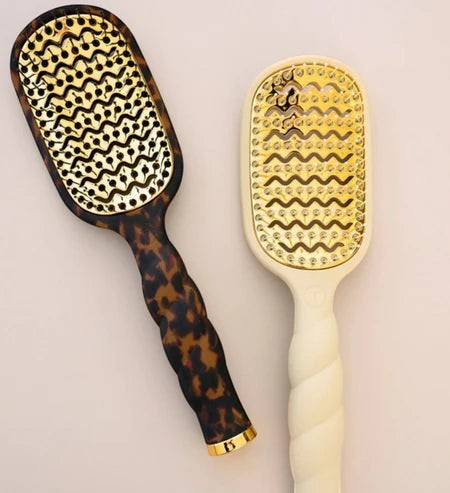 Doodlations Coffee Bar & Boutique mini vented hair brushes in tortoiseshell and cream with ergonomic coil handles.