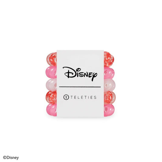Doodlations Coffee Bar & Boutique Minnie Mouse tiny hair ties in shades of pink and red on a branded display card.