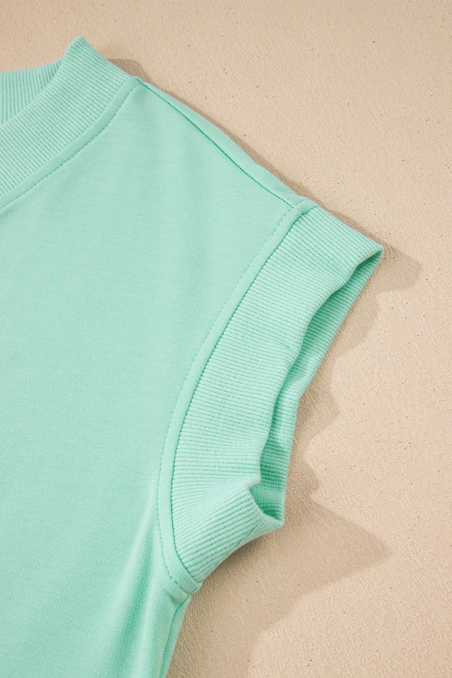 Doodlations Coffee Bar & Boutique mint green V-neck lounge set, short sleeve top with ribbed cuffs.