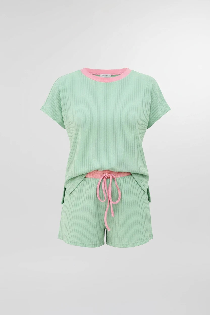 Doodlations Coffee Bar & Boutique mint green ribbed 2-piece set with pink trim on neckline and drawstring waist shorts.