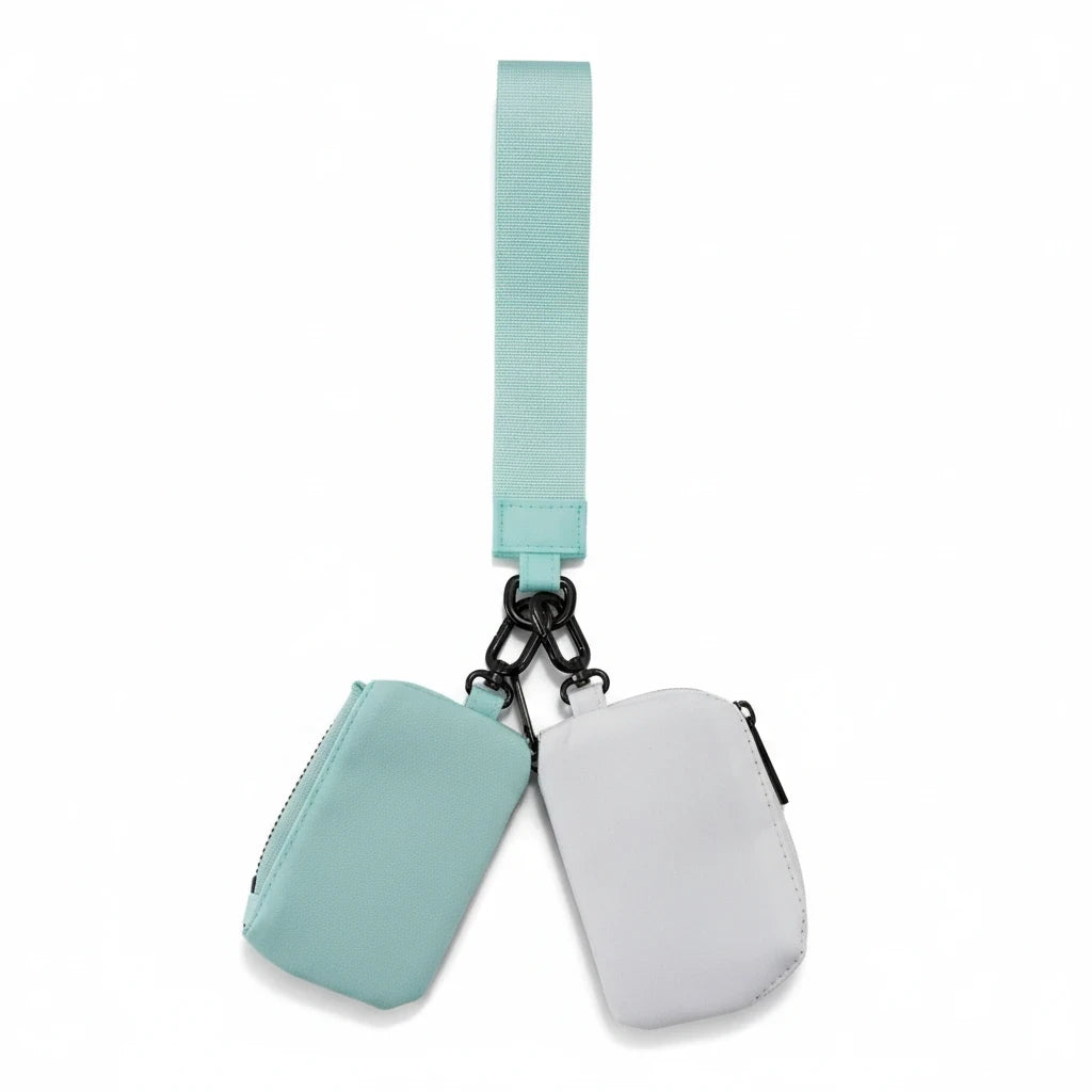 Doodlations Coffee Bar & Boutique mint and white double pouch wristlet set with a matching mint fabric wrist strap.
