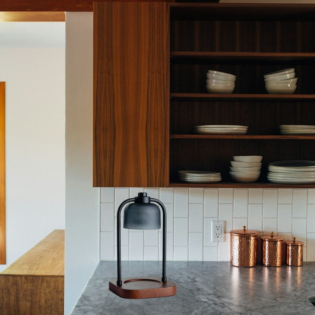 Doodlations Coffee Bar & Boutique modern candle warmer lamp with dark metal and wood base.