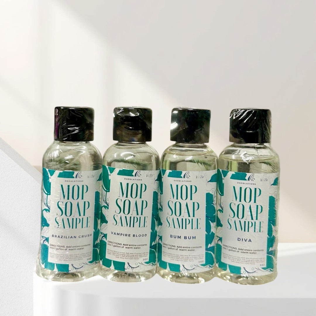Doodlations Coffee Bar & Boutique Mop Soap Sample Pack featuring four 3 oz bottles with black caps and teal labels.