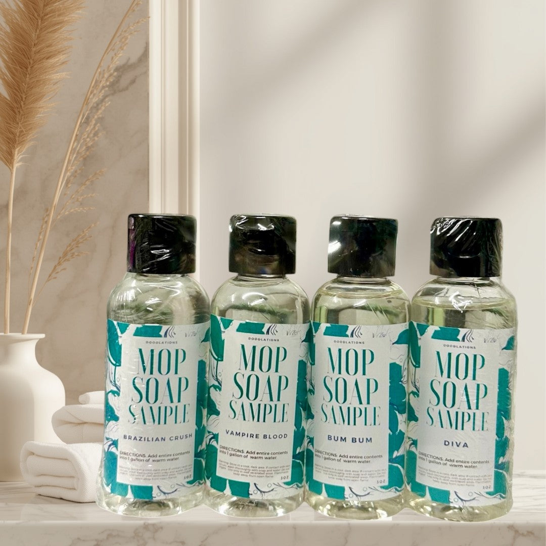 Doodlations Coffee Bar & Boutique Mop Soap Sample Pack with 4 bottles of concentrated cleaning soap in various scents.