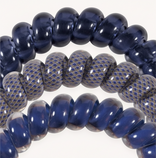 Doodlations Coffee Bar & Boutique Teleties Twilight Tones spiral coil hair ties in navy blue and patterned designs.