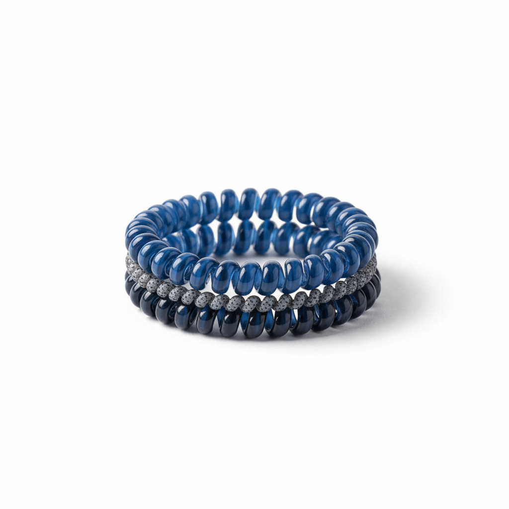 Doodlations Coffee Bar & Boutique Teleties Twilight Tones spiral coil hair ties in navy blue and grey shades.