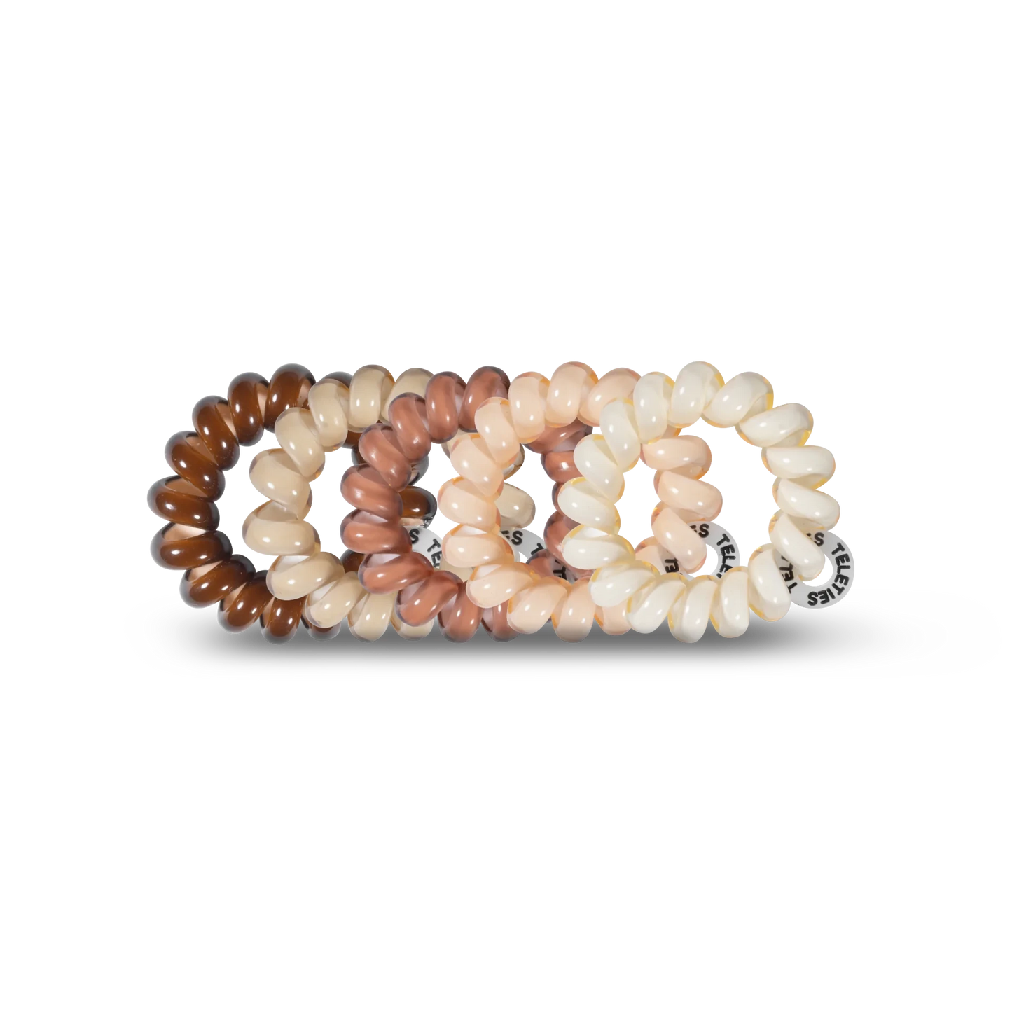Doodlations Coffee Bar & Boutique For the Love of Nudes spiral hair ties in a gradient of neutral brown shades.