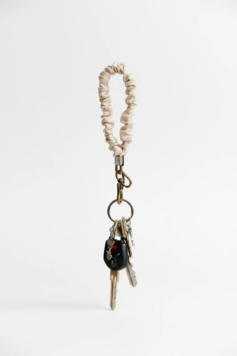 Doodlations Coffee Bar & Boutique oat milk luxe fabric scrunchie keychain with gold hardware and attached keys