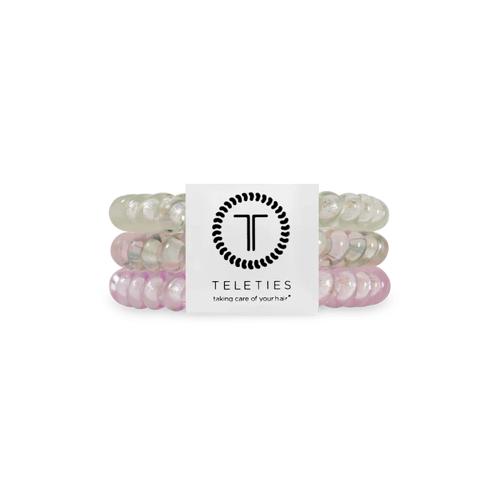 Doodlations Coffee Bar & Boutique Opal Glow hair ties in purple and green shimmer with a coil design in a pack of three