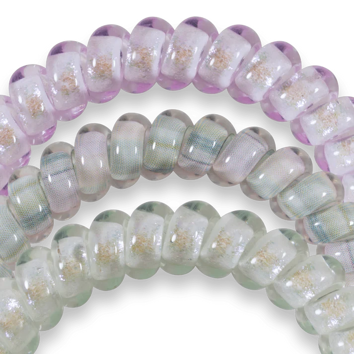 Doodlations Coffee Bar & Boutique Opal Glow hair ties in purple and green shimmer with a spiral, no-damage design.