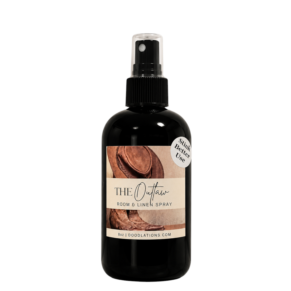 Doodlations Coffee Bar & Boutique The Outlaw room and linen spray in a black bottle with a western-themed label.