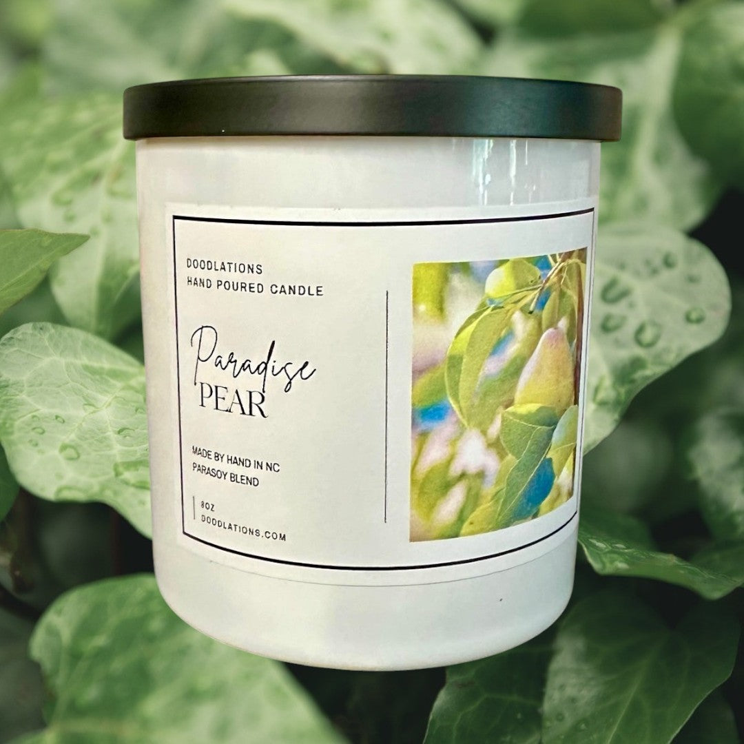 Doodlations Coffee Bar & Boutique Paradise Pear hand-poured para-soy blend candle with tropical fruit and floral scent.