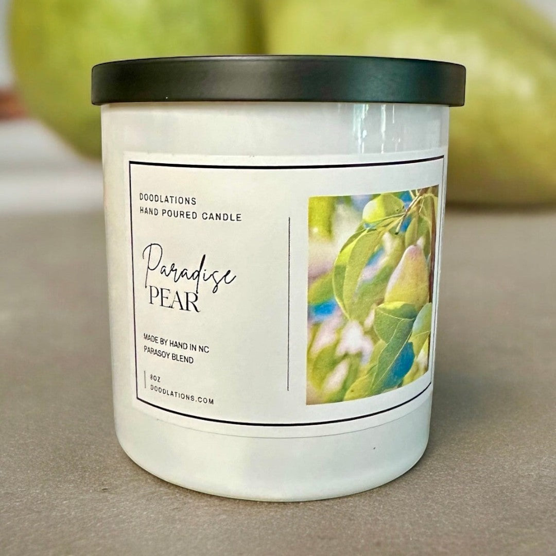 Doodlations Coffee Bar & Boutique Paradise Pear hand-poured para-soy blend candle with tropical fruit and floral scent.