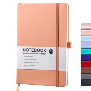 Doodlations Coffee Bar & Boutique A5 hardcover dotted journal in peach with elastic closure and pen loop