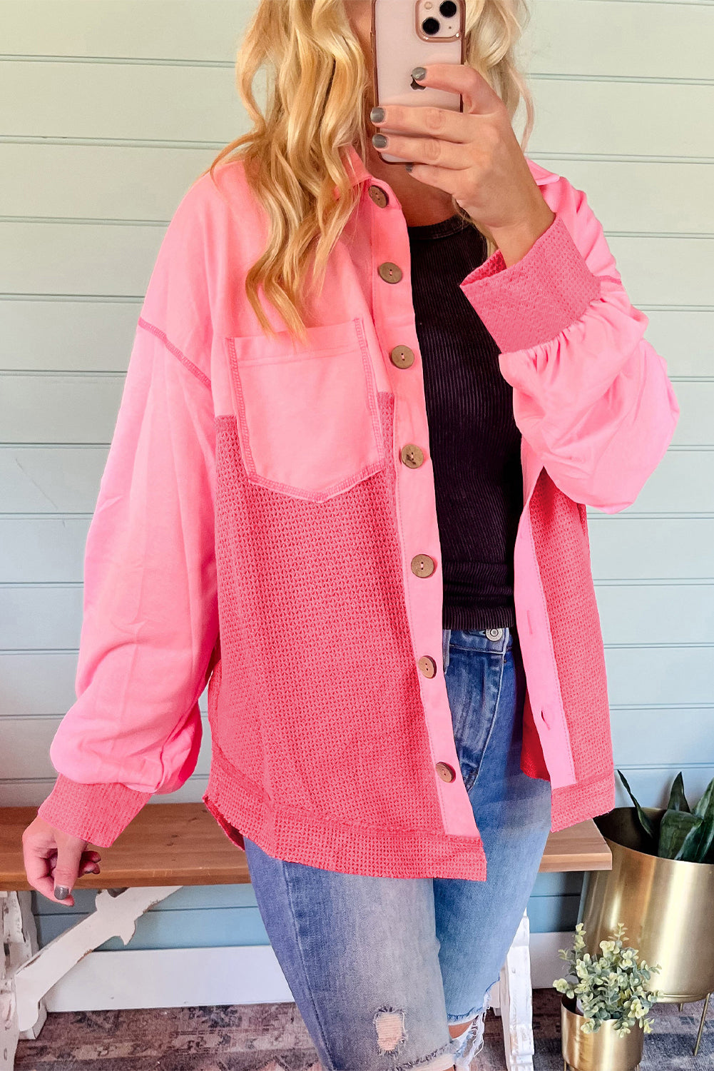 Doodlations Coffee Bar & Boutique two-tone peach waffle knit shacket with button-front and relaxed fit on a model.