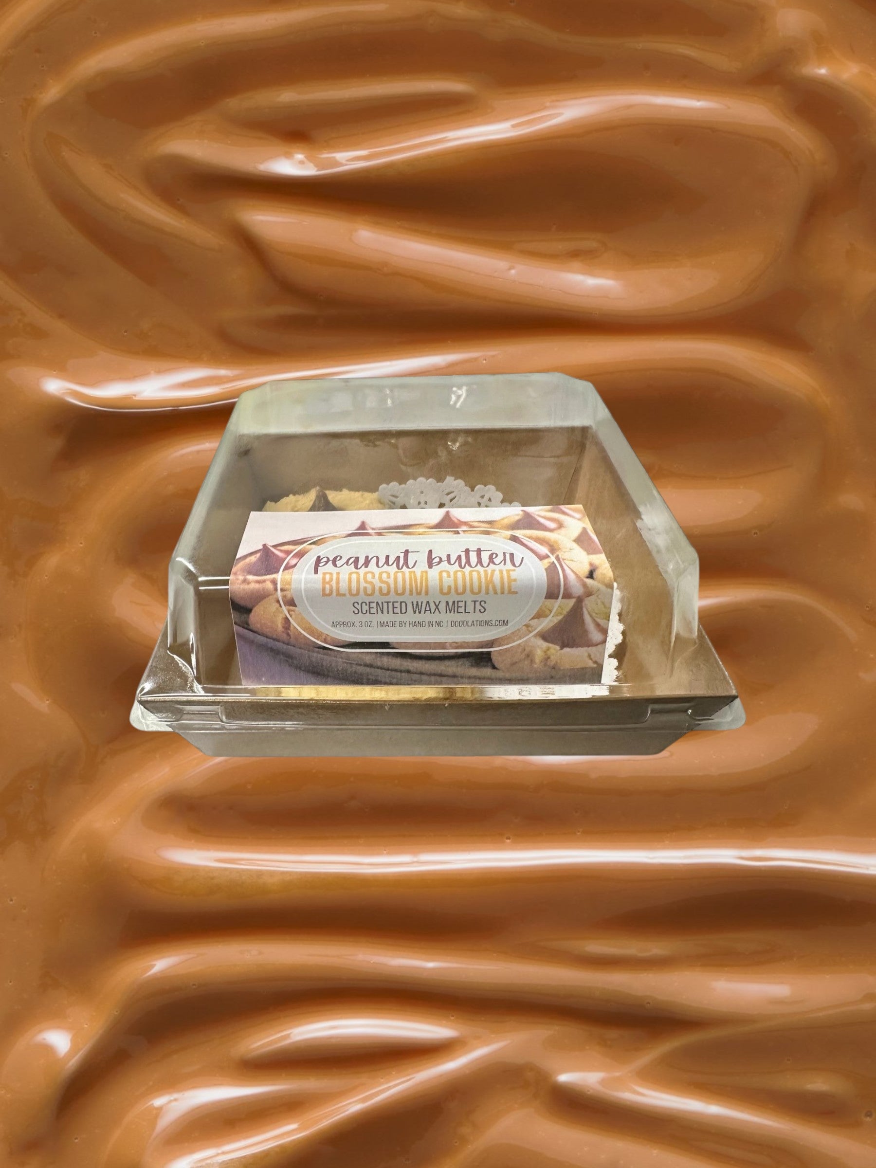 Doodlations Coffee Bar & Boutique Peanut Butter Blossom Cookie scented wax melts in a clear-top box.