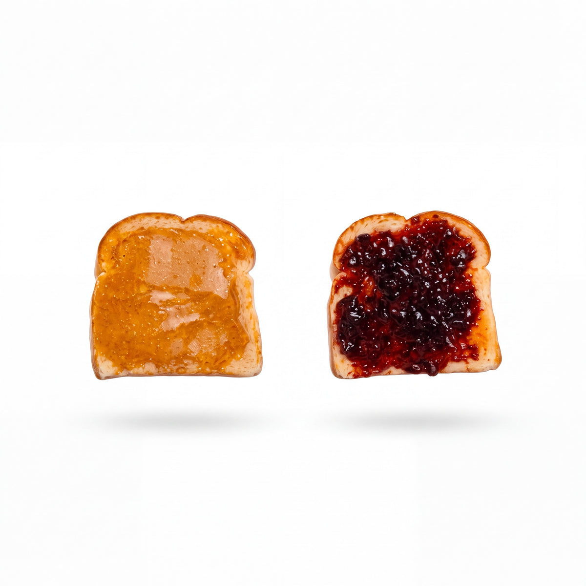 Doodlations Coffee Bar & Boutique handmade peanut butter and jelly toast earrings with a clear matte finish.