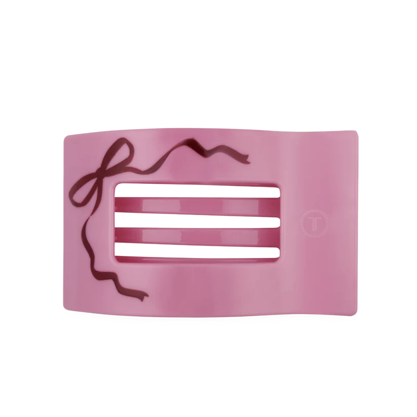 Doodlations Coffee Bar & Boutique pink flat square hair clip with a bow design for comfortable all-day wear.