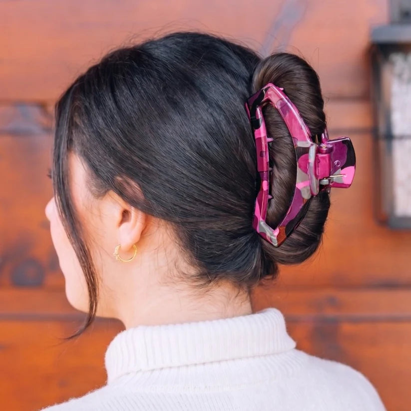 Doodlations Coffee Bar & Boutique Teletties Garden Glam open claw hair clip in pink and grey worn in a hair bun