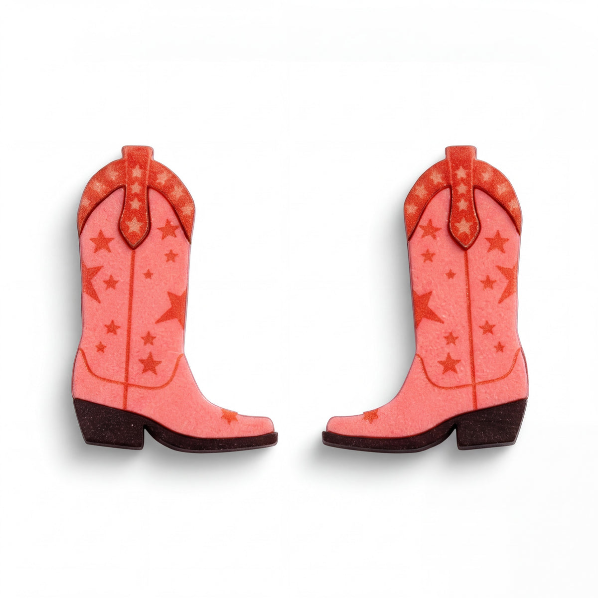 Doodlations Coffee Bar & Boutique pink cowgirl boot stud earrings with star patterns and dark brown heels