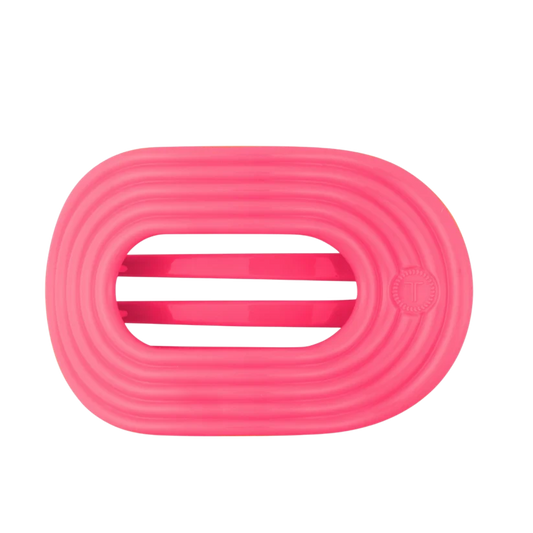 Doodlations Coffee Bar & Boutique Tropic Twist flat pink round hair clip with flexible, durable design.