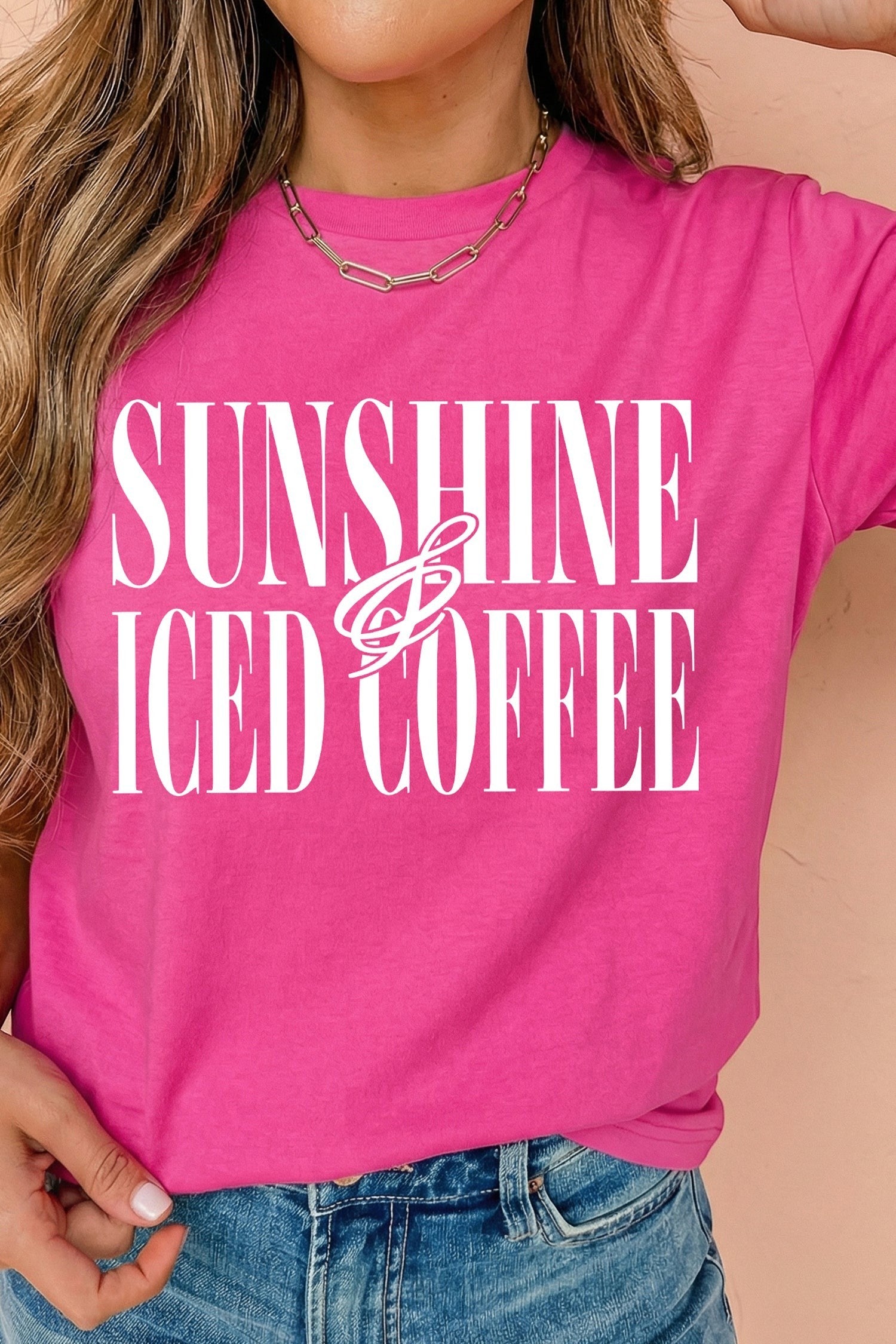 Doodlations Coffee Bar & Boutique hot pink crewneck t-shirt with white Sunshine and Iced Coffee graphic print