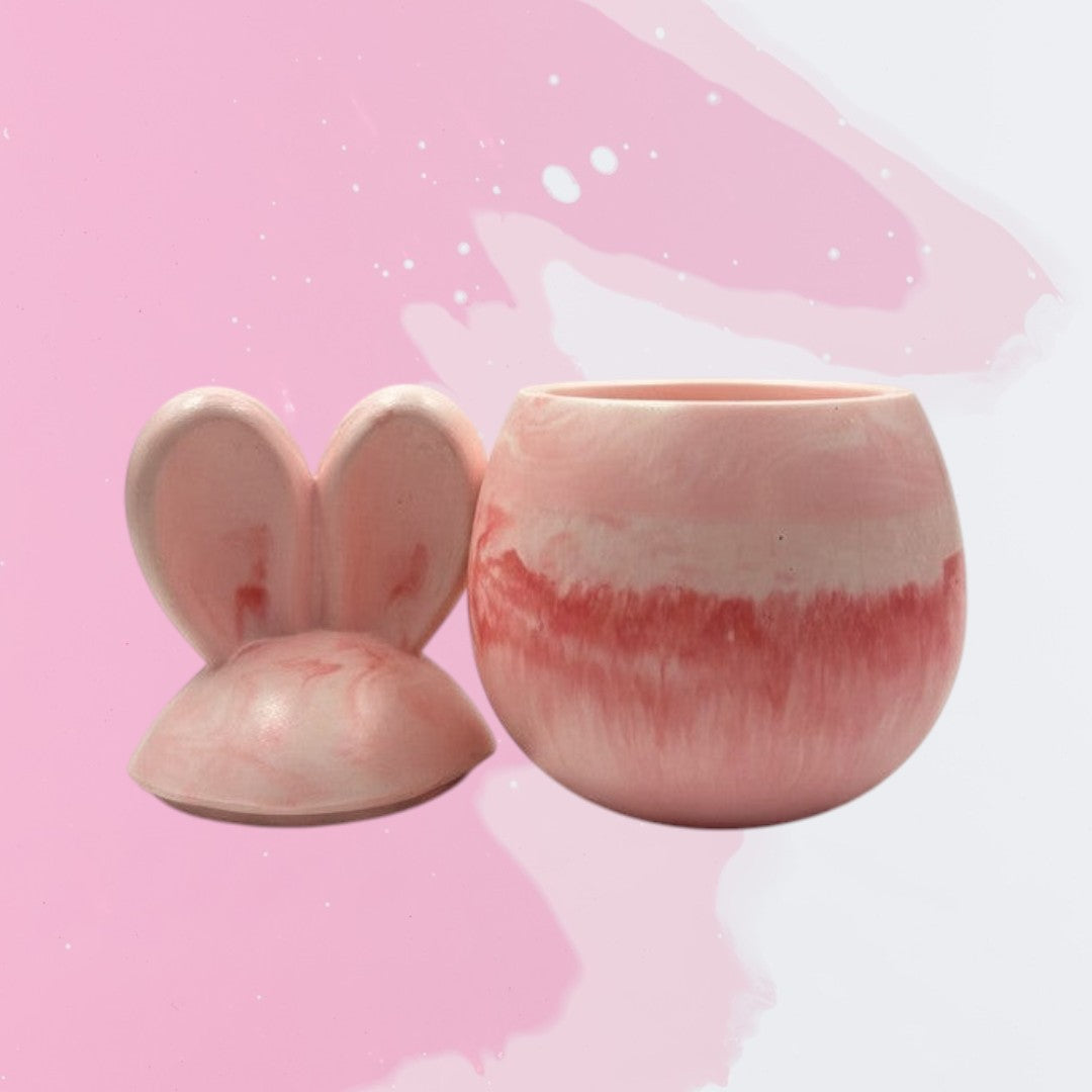 Doodlations Coffee Bar & Boutique marbled pink concrete bunny candle with lid, soy blend wax, 9oz