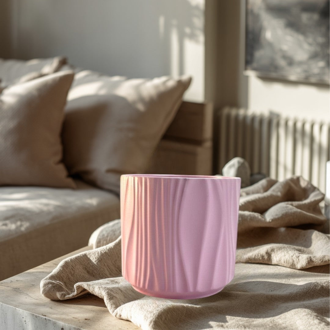 Doodlations Coffee Bar & Boutique pink marbled concrete candle with wavy texture. 4oz soy blend wax.