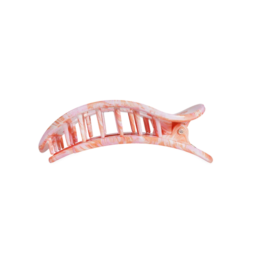 Doodlations Coffee Bar & Boutique Just Keep Swimming flat round hair clip in a pink and white marbled pattern