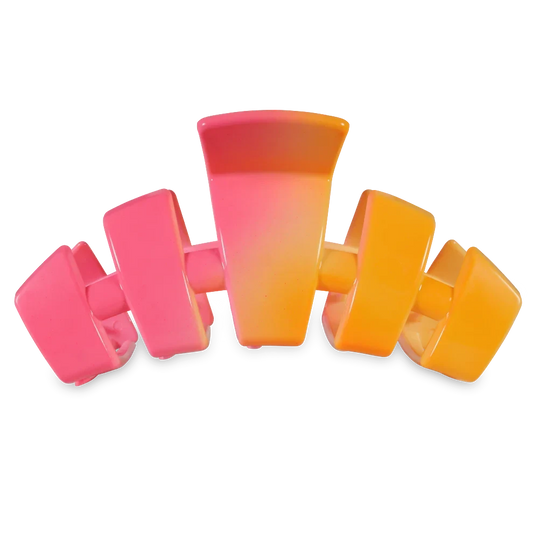 Doodlations Coffee Bar & Boutique pink and orange ombre segmented claw hair clip for secure styling.