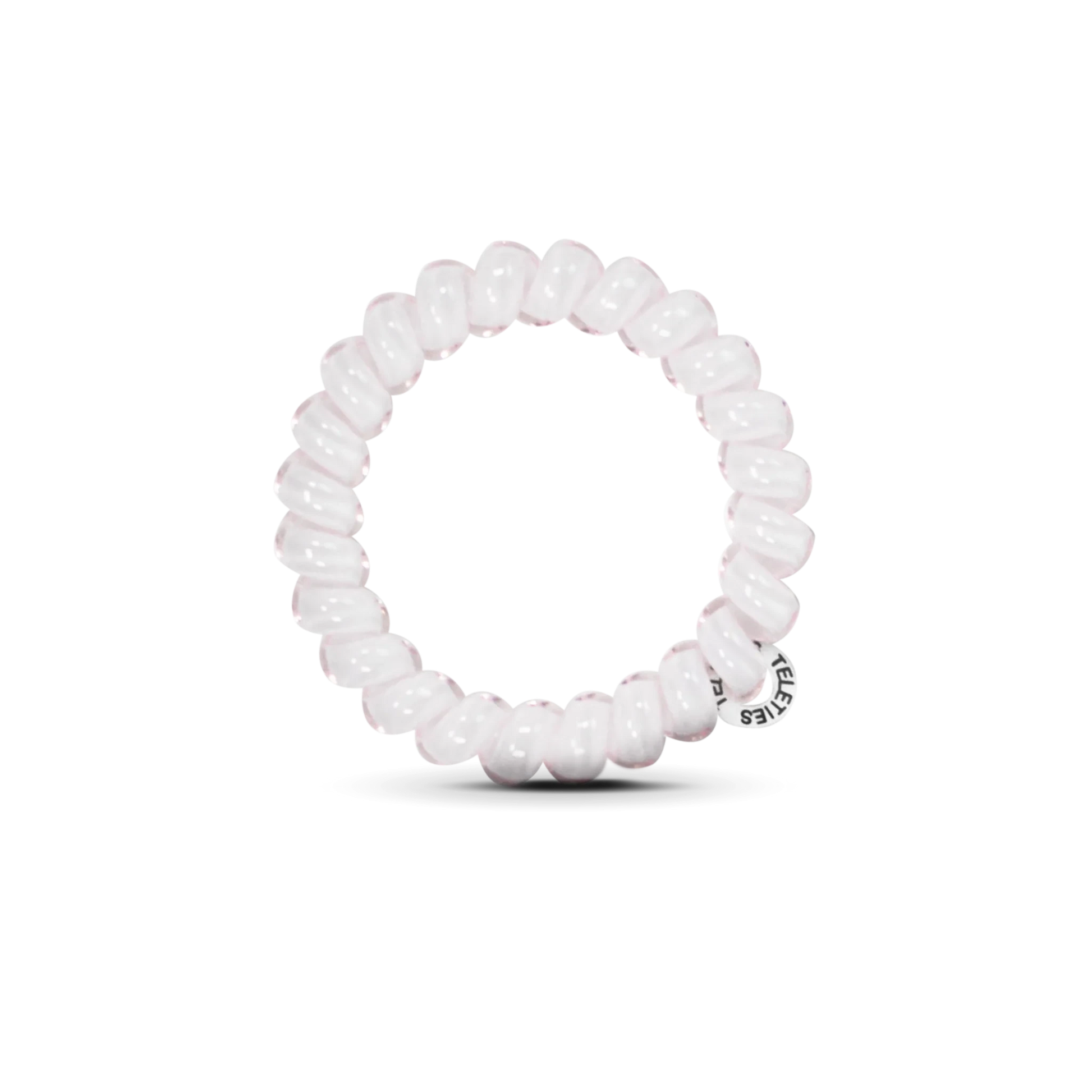 Doodlations Coffee Bar & Boutique rose water pink spiral hair tie with a strong, damage-free coil design.