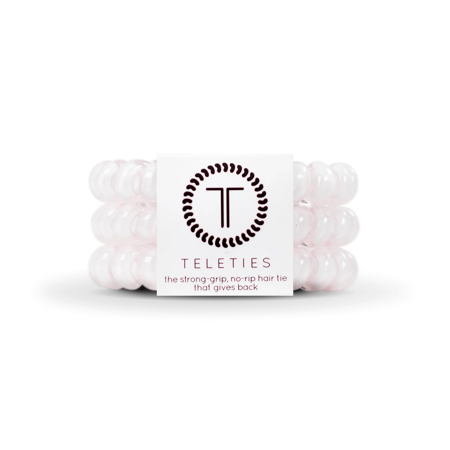 Doodlations Coffee Bar & Boutique rose water pink spiral hair ties with a strong grip and no-rip design.