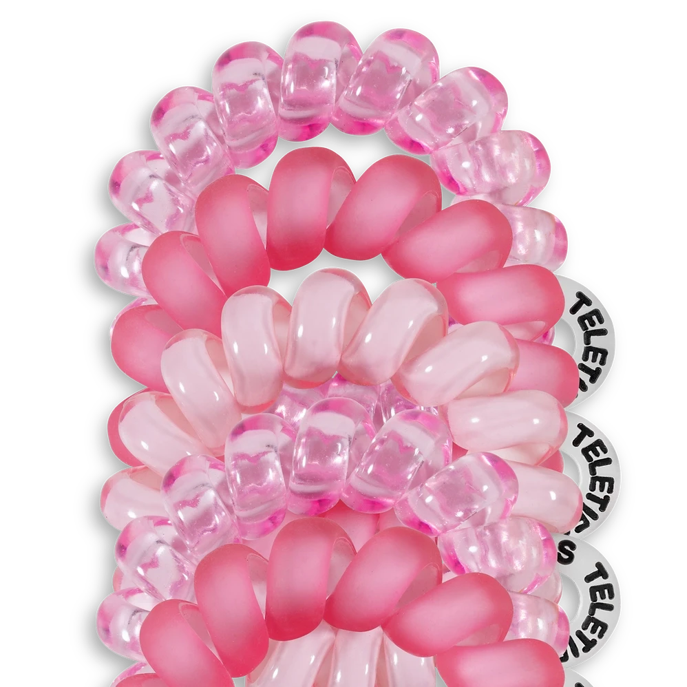 Doodlations Coffee Bar & Boutique pack of five pink spiral coil hair ties for thin hair on a black background
