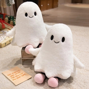 Doodlations Coffee Bar & Boutique pair of white plush ghost toys with friendly embroidered faces and pink feet