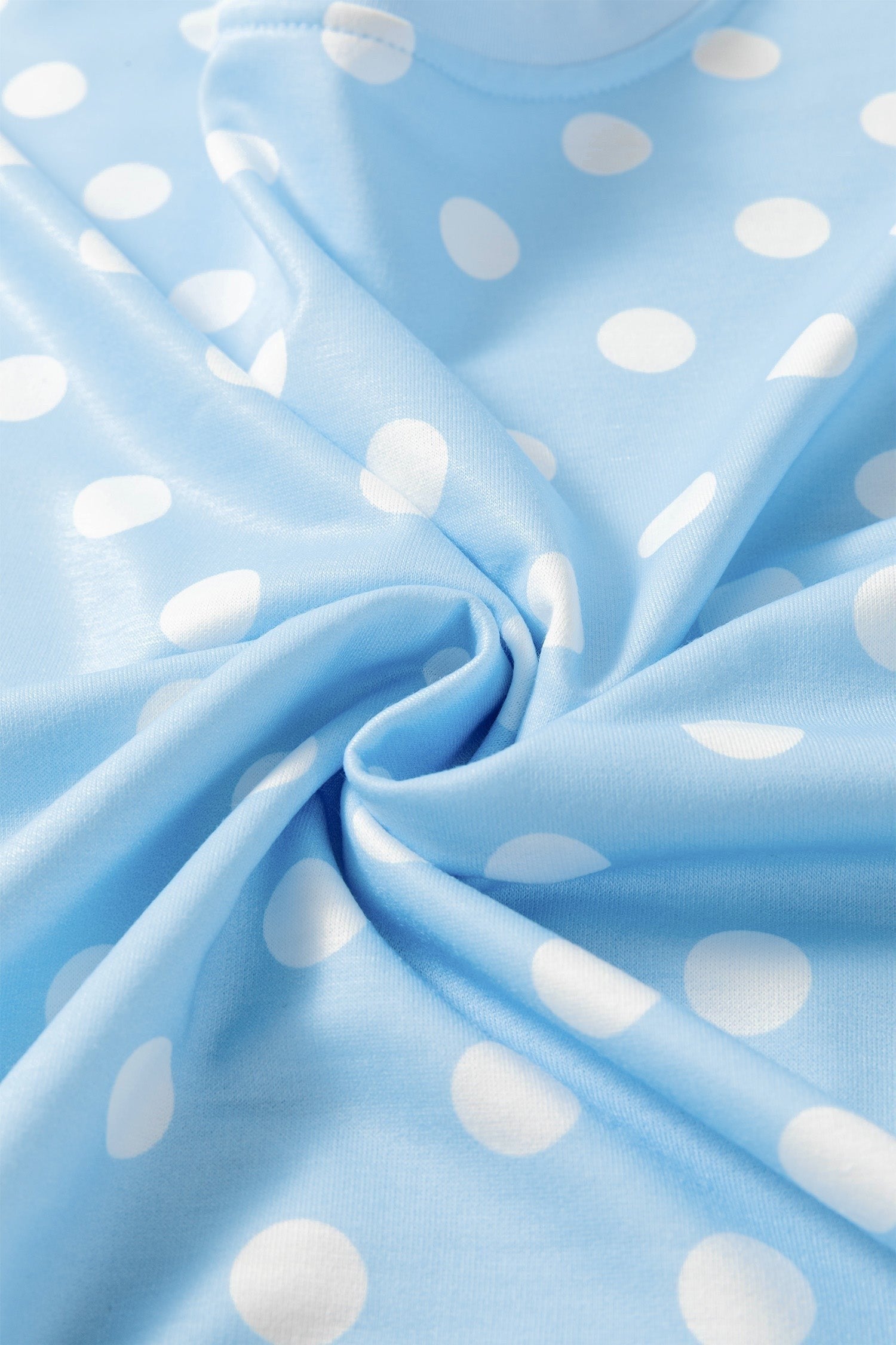 Doodlations Coffee Bar & Boutique light blue lounge set fabric with a white polka dot pattern and soft texture