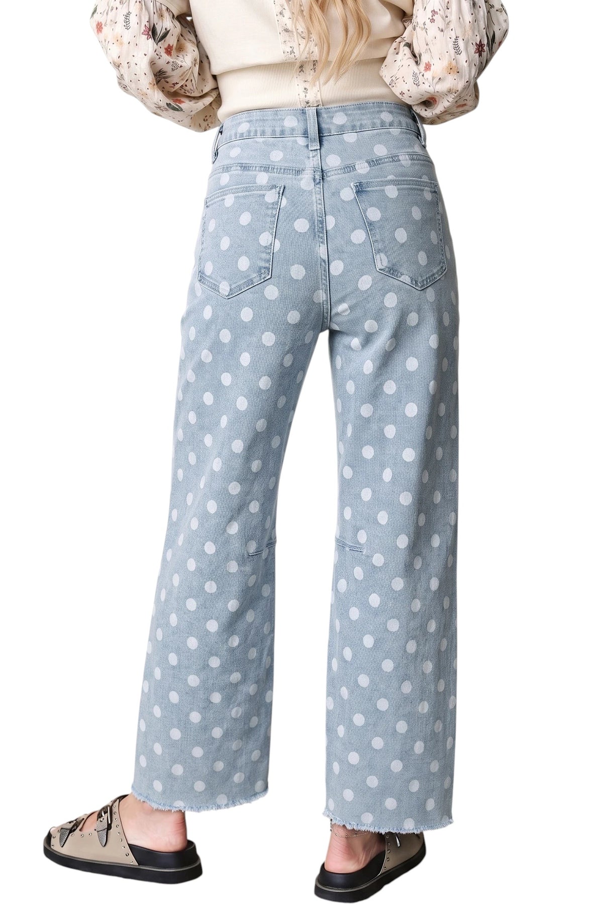 Doodlations Coffee Bar & Boutique sky blue denim jeans with white polka dots and a raw hem, back view