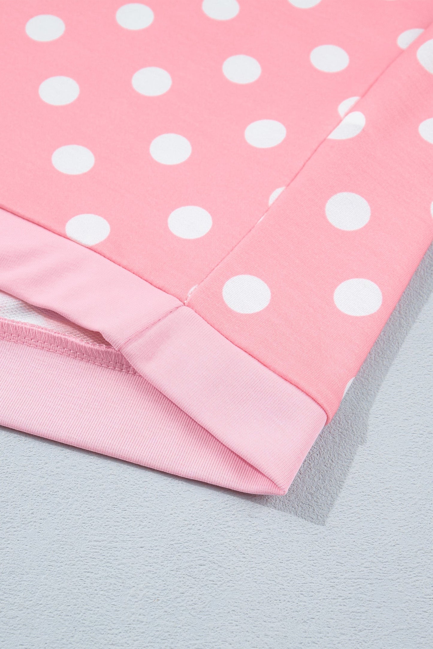 Doodlations Coffee Bar & Boutique pink lounge set with white polka dots and cuffed hem detail