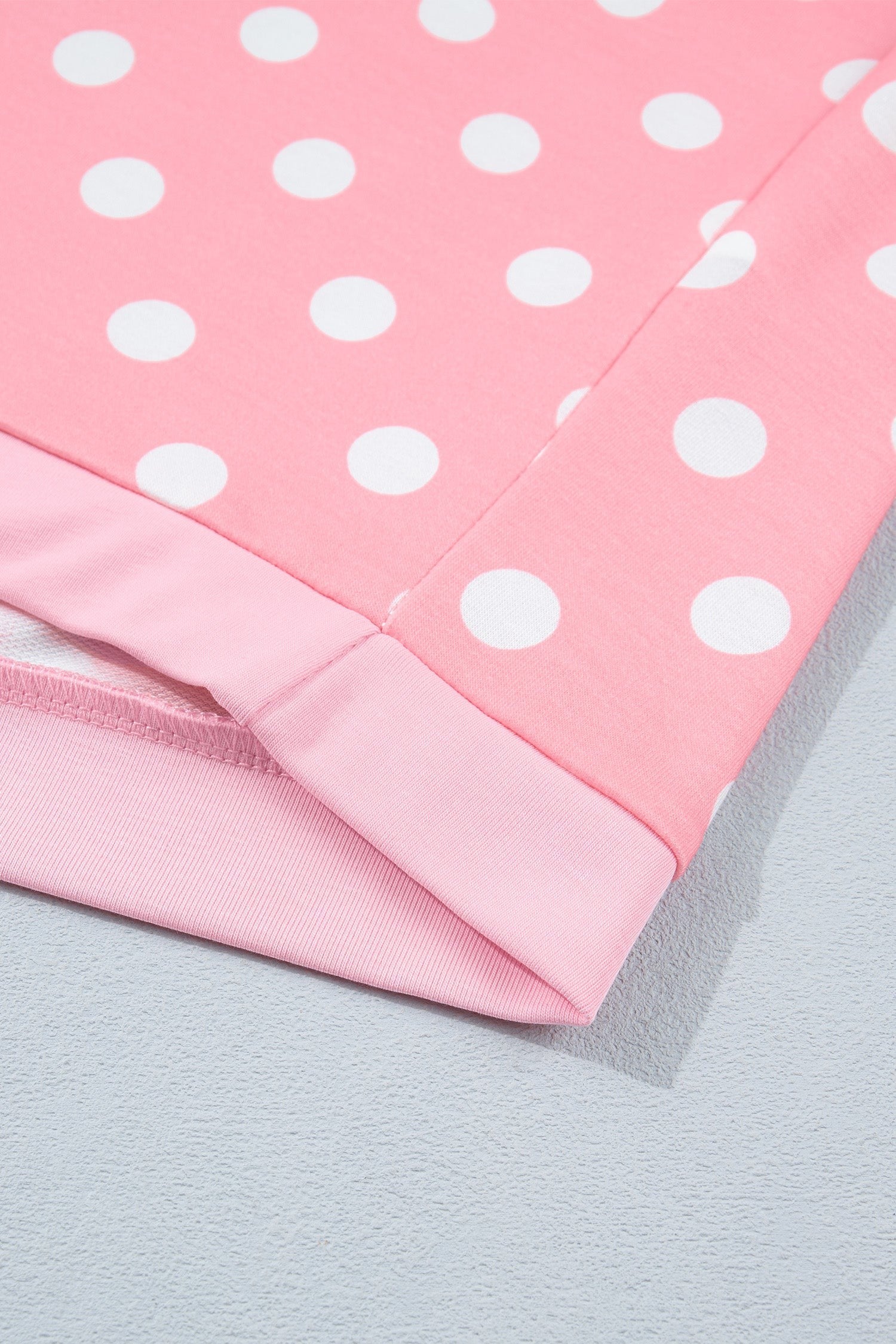 Doodlations Coffee Bar & Boutique pink lounge set with white polka dots and cuffed hem detail